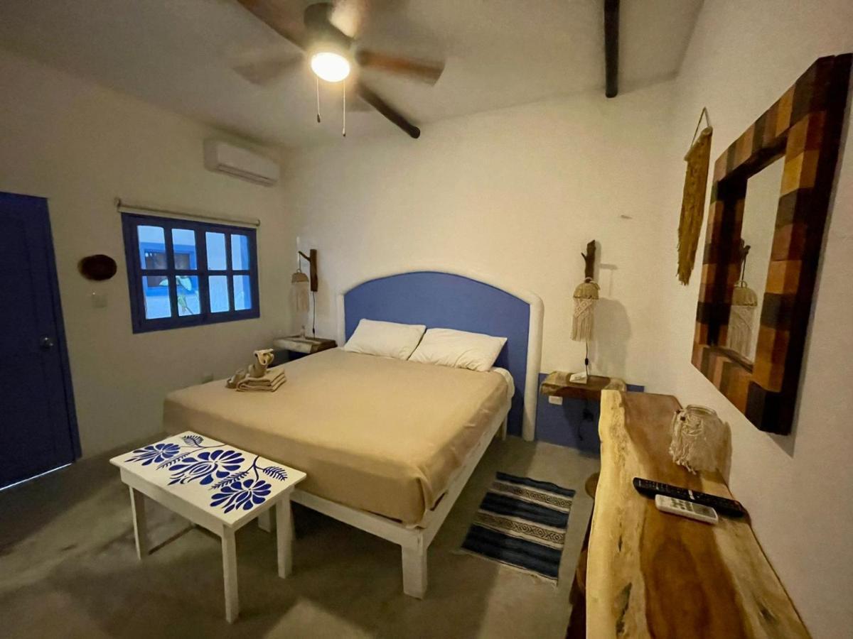 Mio Tulum Hotel Boutique Exterior photo A bedroom in a hotel in San Cristóbal de Las Casas, Chiapas, Mexico