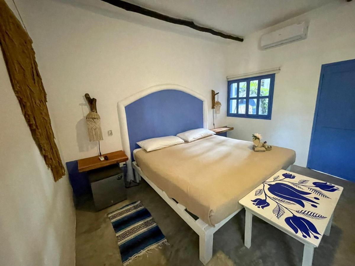 Mio Tulum Hotel Boutique Exterior photo A bedroom in a hotel in Oaxaca, Mexico